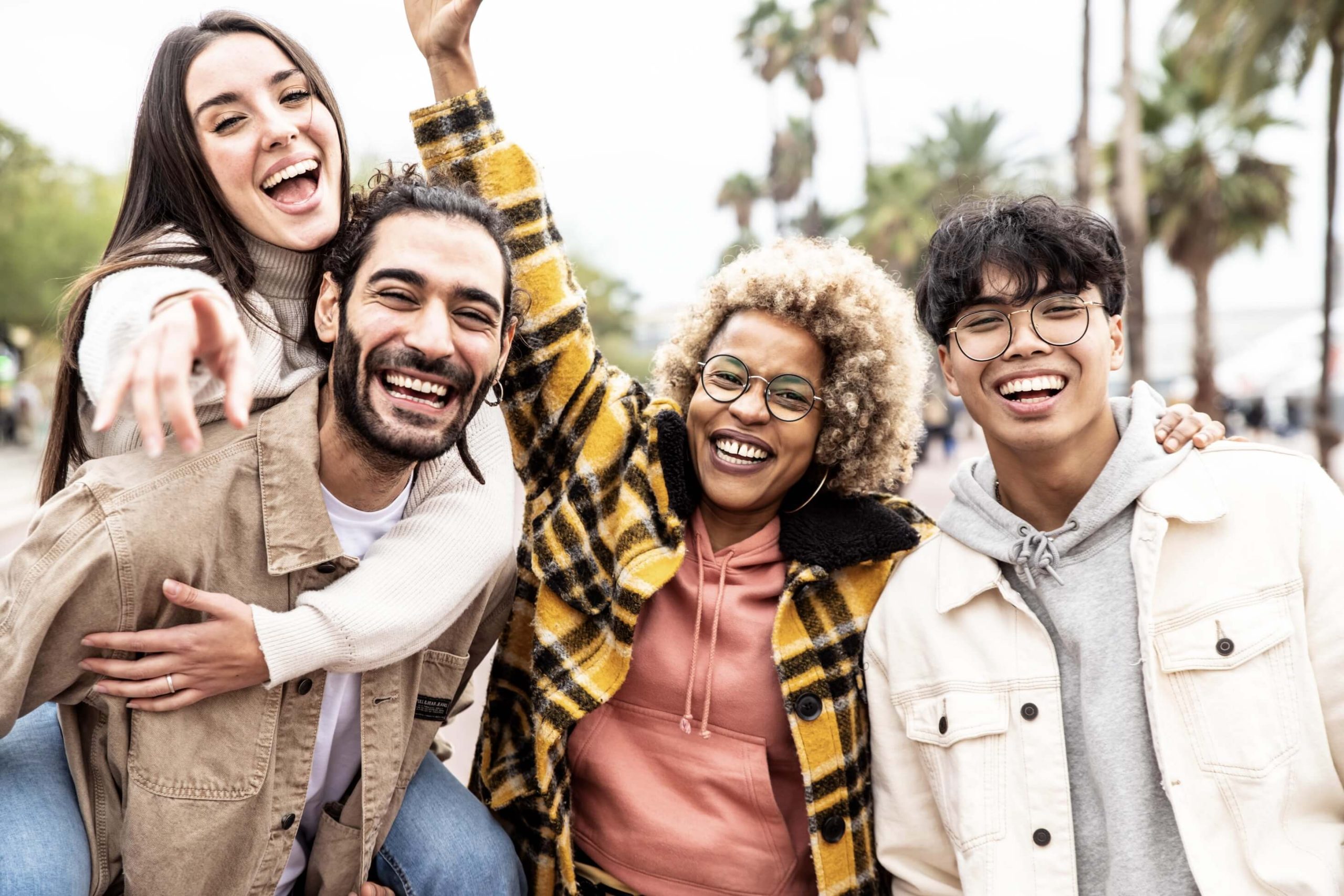 multiracial-group-of-young-people-smiling-together-