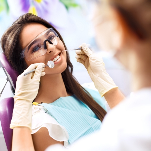 الدكتور سليم كيالي Patient receiving dental treatment in clinic.